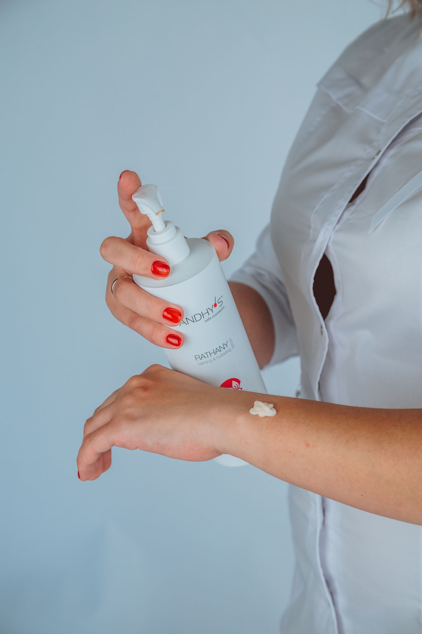 Small amount of skincare lotion being tested on the hand