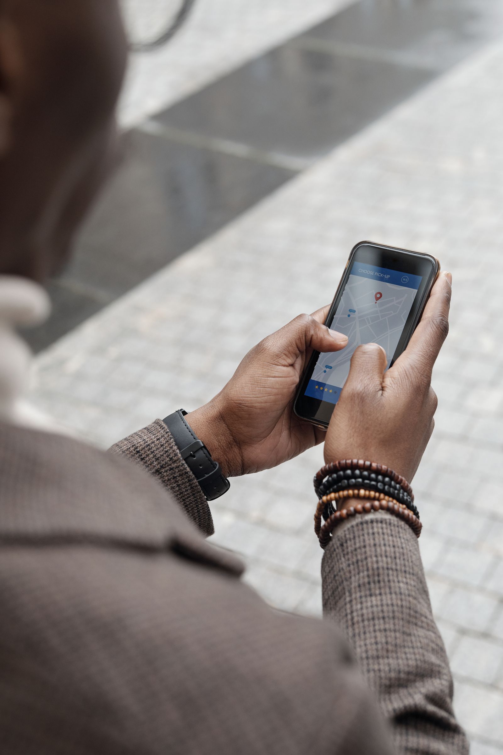 Person checking map directions on a smartphone