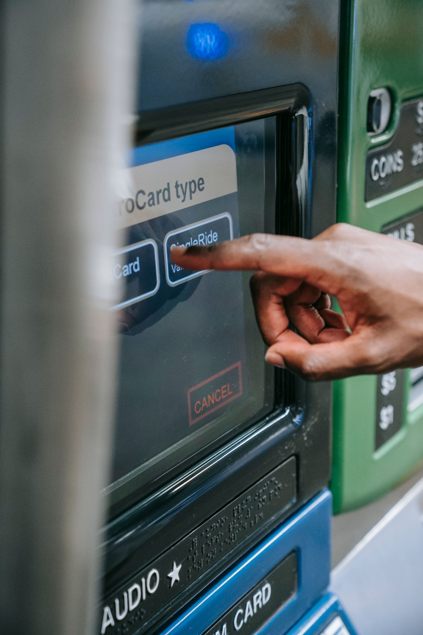 Person using an ATM touchscreen